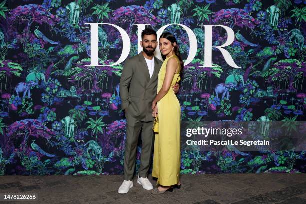 Virat Kholi and Anushka Sharma attend the Christian Dior Womenswear Fall 2023 show at the Gateway of India monument on March 30, 2023 in Mumbai,...