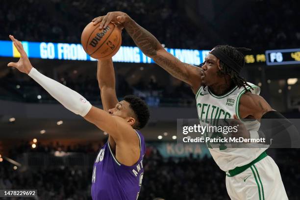 Robert Williams III of the Boston Celtics blocks a shot by Giannis Antetokounmpo of the Milwaukee Bucks in the first half at Fiserv Forum on March...