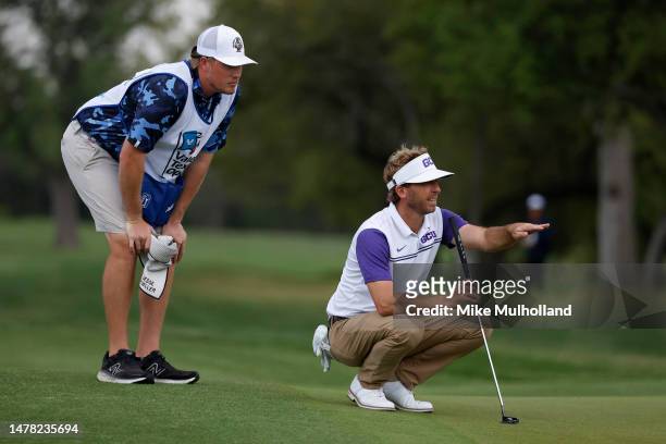 Jesse Mueller of the United States lines up a putt on the sixth green during the first round of the Valero Texas Open at TPC San Antonio on March 30,...