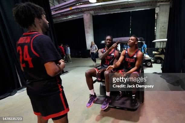 Nathan Mensah, Lamont Butler and Tyler Broughton of the San Diego State Aztecs talk during media availability for the Final Four as part of the NCAA...