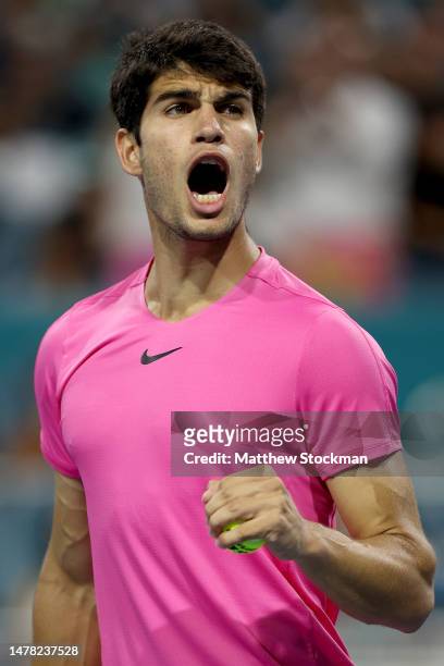Carlos Alcaraz of Spain celebrates match point against Taylor Fritz of the United States during the quarterfinals of the Miami Open at Hard Rock...