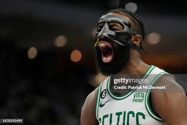 Jaylen Brown of the Boston Celtics reacts after making a basket against the Milwaukee Bucks in the second half at Fiserv Forum on March 30, 2023 in...