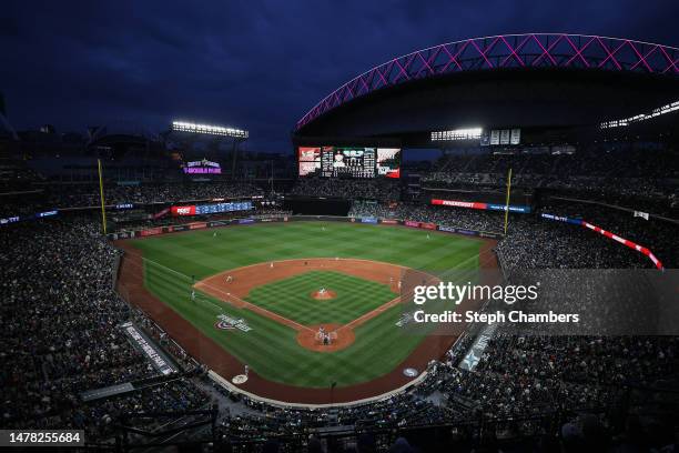 Luis Castillo of the Seattle Mariners pitches during the third inning against the Cleveland Guardians during Opening Day at T-Mobile Park on March...