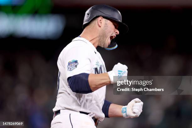 Ty France of the Seattle Mariners celebrates his three run home run against the Cleveland Guardians during the eighth inning during Opening Day at...