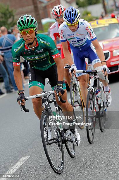 Yukiya Arashiro of Japan riding for Europcar leads the breakaway group with Anthony Delaplace of France riding for Saur-Sojasun and David Moncoutie...