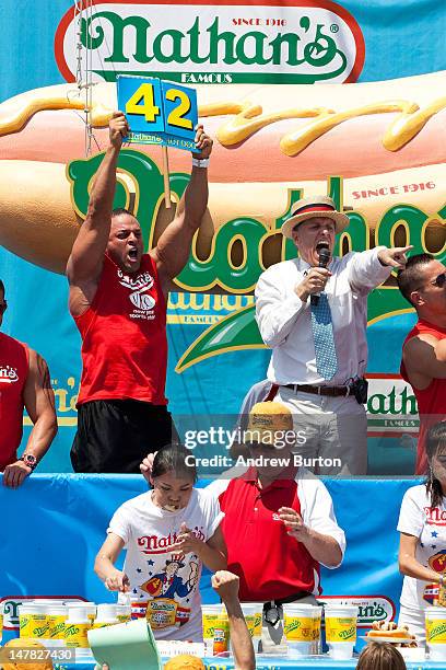 Competitive eater Sonya Thomas passes her previous women's world record of 40 hot dogs while competing in the Nathan's Famous International Hot Dog...