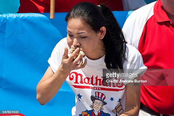 Competitive eater Sonya Thomas competes in the Nathan's Famous International Hot Dog Eating Contest at Coney Island on July 4, 2012 in the Brooklyn...