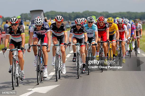 Yaroslav Popovych of the Ukraine riding for Radioshack-Nissan drive the peloton as the team defended the overall race leader's yellow jersey of...