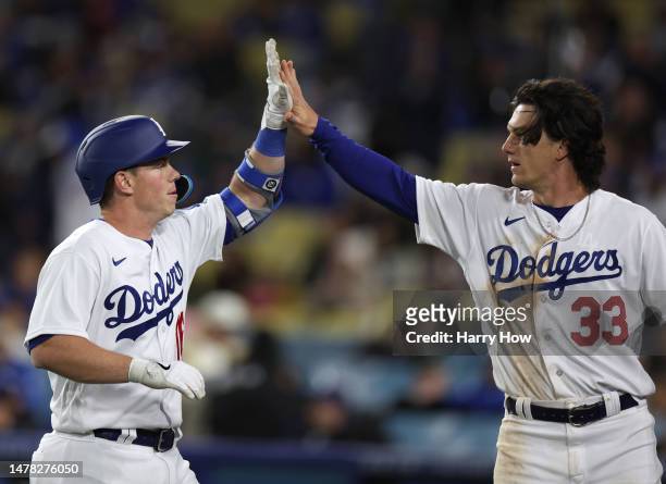 Will Smith of the Los Angeles Dodgers celebrates his sacrifice fly for his fourth RBI of the night, to score James Outman and take an 8-2 lead over...