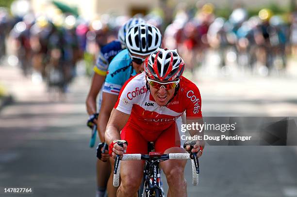 Samuel Dumoulin of France riding for Cofidis leads Sylvain Chavanel of France riding for Omega Pharma-QuickStep and Wout Poels of The Netherlands...