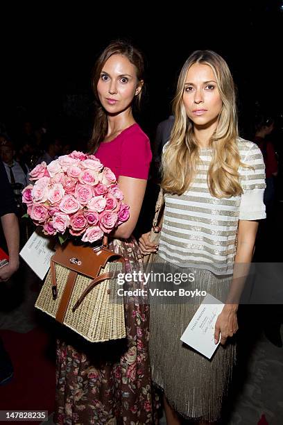 Svetlana Metkina and Aleksandra Melnichenko attend the Ulyana Sergeenko Haute-Couture Show as part of Paris Fashion Week Fall / Winter 2013 at...