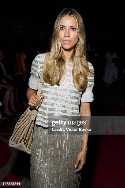 Aleksandra Melnichenko attends the Ulyana Sergeenko Haute-Couture Show as part of Paris Fashion Week Fall / Winter 2013 at Theatre Marigny on July 3,...