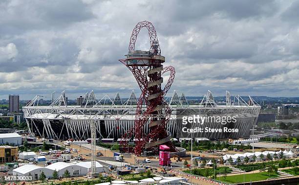 General view of the the ArcelorMittal Orbit sculpture standing in front of the Olympic Stadium in the Olympic Park on July 04, 2012 in London,...