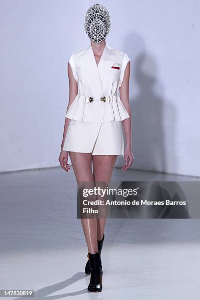 Model walks the runway duringthe Maison Martin Margiela Haute-Couture Show as part of Paris Fashion Week Fall / Winter 2012/2013 at Espace Commines...