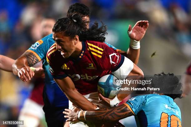 Marino Mikaele Tu’u of the Highlanders makes a break during the round five Super Rugby Pacific match between Moana Pasifika and Hurricanes at Mt...