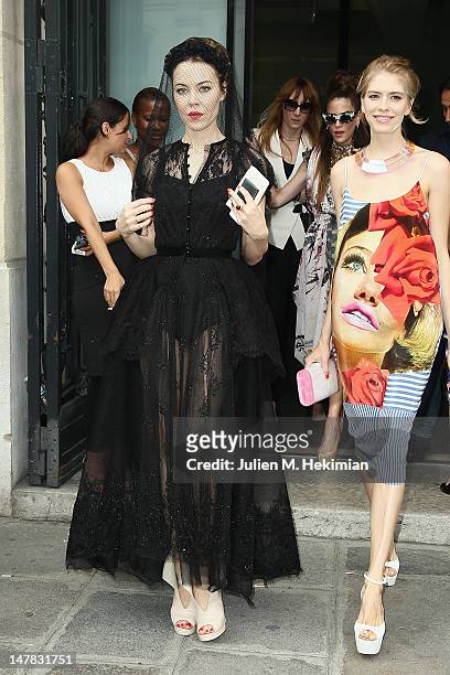 Ulyana Sergeenko and Elena Perminova attend the Jean-Paul Gaultier Haute-Couture Show as part of Paris Fashion Week Fall / Winter 2012/13 on July 4,...