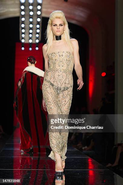 Andreja Pejic walks the runway during the Jean-Paul Gaultier Haute-Couture Show as part of Paris Fashion Week Fall / Winter 2013 on July 4, 2012 in...