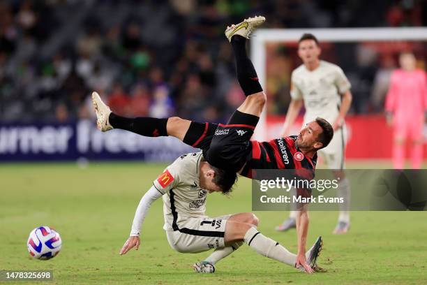 Romain Amalfitano of the Wanderers falls on Craig Goodwin of Adelaide United during the round 22 A-League Men's match between Western Sydney...