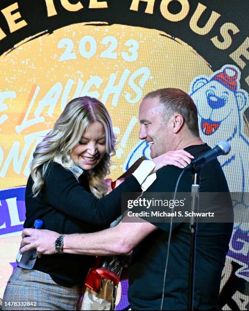 President of the Los Angeles Lakers and comedian Jay Mohr onstage together at The Ice House Comedy Club on March 30, 2023 in Pasadena, California.