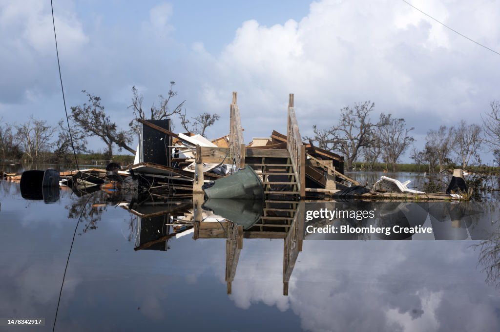 Remains Of A House Submerged In Floodwater