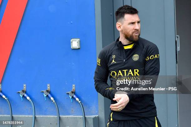 Leo Messi looks on during a Paris Saint-Germain training session at PSG training center on March 31, 2023 in Paris, France.