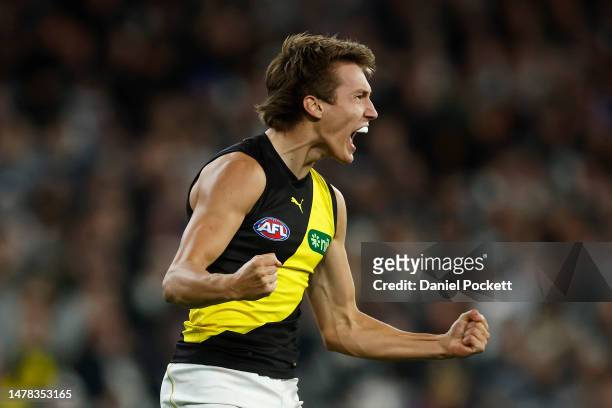Judson Clarke of the Tigers celebrates kicking a goal during the round three AFL match between Collingwood Magpies and Richmond Tigers at Melbourne...