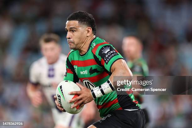 Cody Walker of the Rabbitohs runs the ball during the round five NRL match between the South Sydney Rabbitohs and Melbourne Storm at Accor Stadium on...