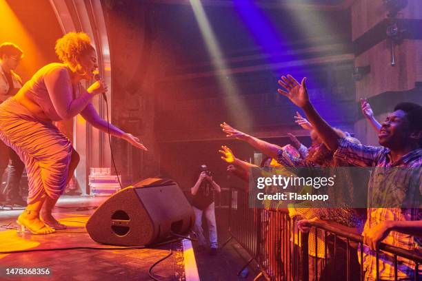 music band on stage. - white female singer stock pictures, royalty-free photos & images