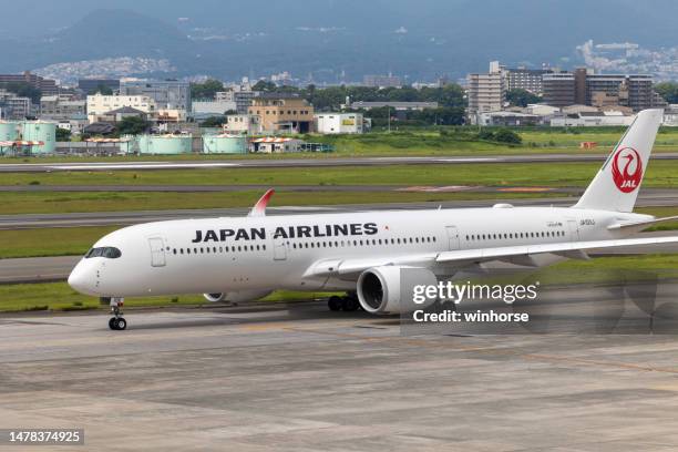 japan airlines airbus a350-941 at osaka international airport, japan - airbus stock symbol stock pictures, royalty-free photos & images