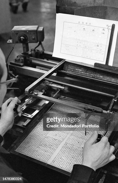 The keyboard of a machine for the composition in Japanese language in the typography of Asahi Shimbun, the Japanese national quodiano. Tokyo ,...