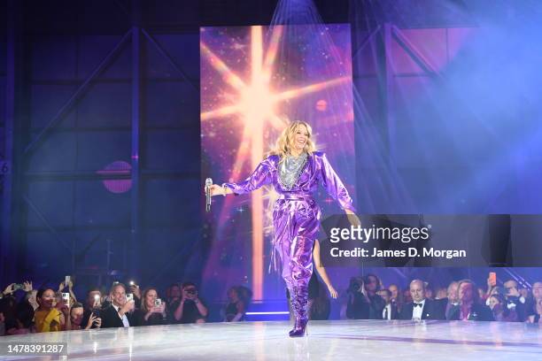 Kylie Minogue performs during the Qantas 100th Gala Dinner at Hangar 96 at Sydney's International Airport on March 31, 2023 in Sydney, Australia. The...