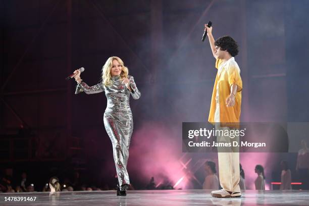 Kylie Minogue and Budjerah perform during the Qantas 100th Gala Dinner at Hangar 96 at Sydney's International Airport on March 31, 2023 in Sydney,...