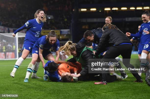 Ann-Katrin Berger of Chelsea celebrates with teammates after making the winning save in a penalty shoot out during the UEFA Women's Champions League...