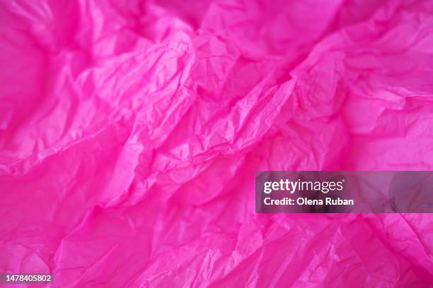 pink plastic bag texture. - celofán fotografías e imágenes de stock