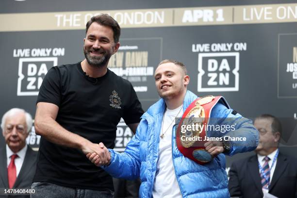 Promoter Eddie Hearn presents new Matchroom Boxing signing Sunny Edwards of Great Britain during the Anthony Joshua v Jermaine Franklin Weigh-In at...