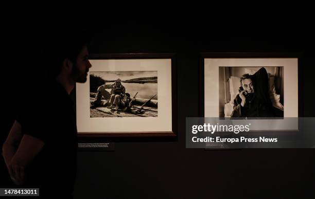 Two works from the Robert Capa exhibition, 'Retrospective', at the Palacio de las Comunicaciones, on March 31 in Valencia, Valencia, Spain. Robert...