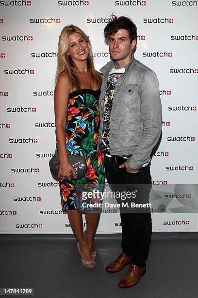 Cheska Hull and Joel Dommett attend the Swatch Chrono Plastic launch party at the Future Gallery on July 4, 2012 in London, England.