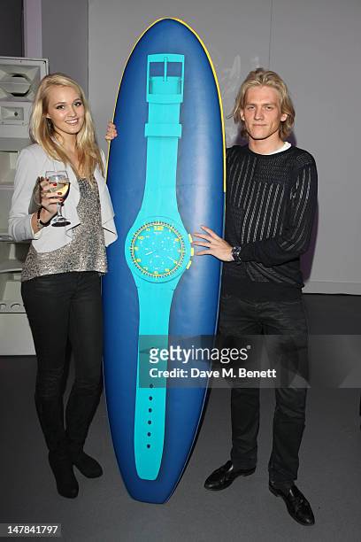Richard Dinan and Ianthe Cochrane-Stack attend the Swatch Chrono Plastic launch party at the Future Gallery on July 4, 2012 in London, England.