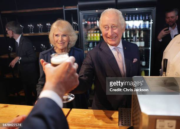 King Charles III and Camilla, Queen Consort toast to their final reception at Schuppen 52 on March 31, 2023 in Hamburg, Germany. The King and The...