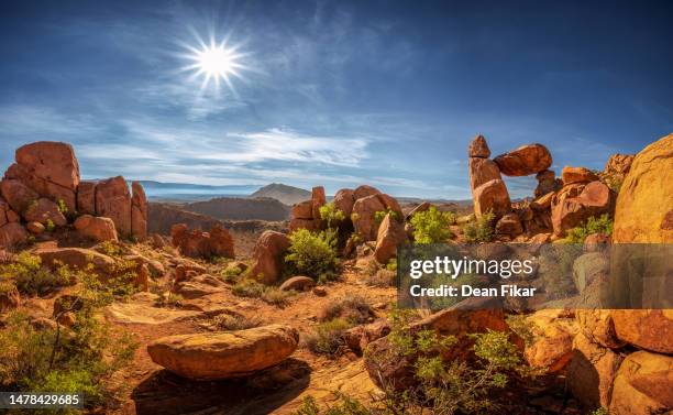 balanced rock formation in under a blazing sun - chisos mountains stock pictures, royalty-free photos & images