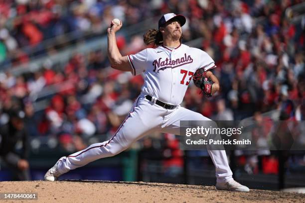 Hunter Harvey of the Washington Nationals pitches against the Atlanta Braves on Opening Day at Nationals Park on March 30, 2023 in Washington, DC.