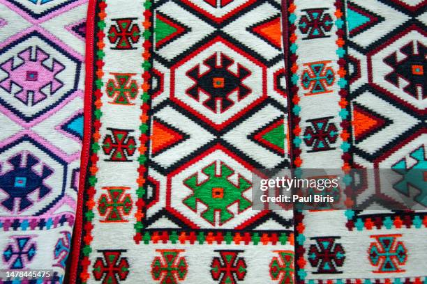 colourful carpets in a shop in the old souk, byblos, lebanon - liban photos et images de collection