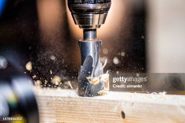 drill in wood - drill stock pictures, royalty-free photos & images