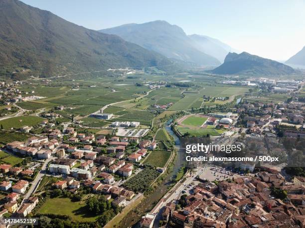 aerial views over the city forts of arco in garda lake italy - arco 2019 stock pictures, royalty-free photos & images
