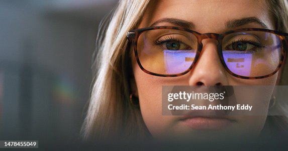 Serious woman, face or glasses for screen reflection in software coding, ux programming or digital website planning at night. Closeup, programmer or developer with vision eyewear for late technology Serious woman, face or glasses for screen reflection in software coding, ux programming or digital website planning at night. Closeup, programmer or developer with vision eyewear for late technology