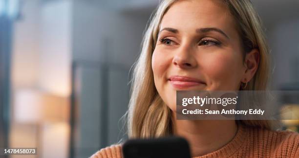 happy woman, face or phone in house living room for social media app, news blog or internet gossip. closeup, smile or relax person on mobile communication technology for meme, late joke or dating sms - meme text stock pictures, royalty-free photos & images