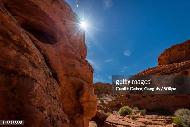 low angle view of rock formation against sky,nevada,united states,usa - nevada day stock pictures, royalty-free photos & images