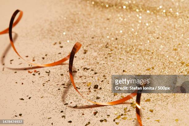 close-up of eyeglasses on sand,romania - 2019 gold stock pictures, royalty-free photos & images