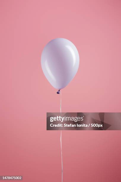 close-up of pink balloon against pink background,romania - balloon ride 個照片及圖片檔