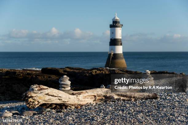 trwyn du lighthouse at penmon point, anglesey, north wales - a point stock pictures, royalty-free photos & images